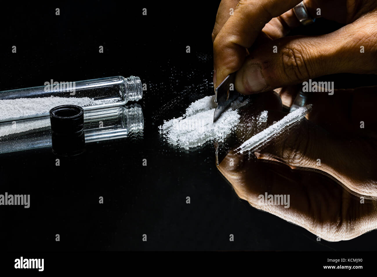 America`s drug epidemic has been brought heavily to light in recent years  and Cocaine ranks high among drugs used by many socioeconomic groups. Stock Photo